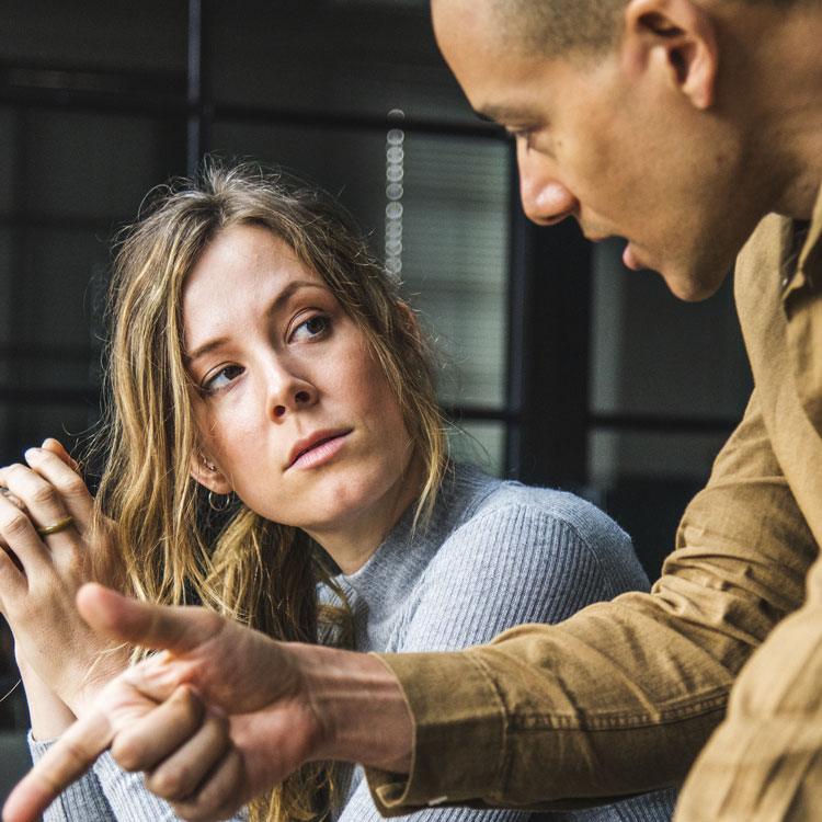 man and woman having a buisness conversation, close up photo